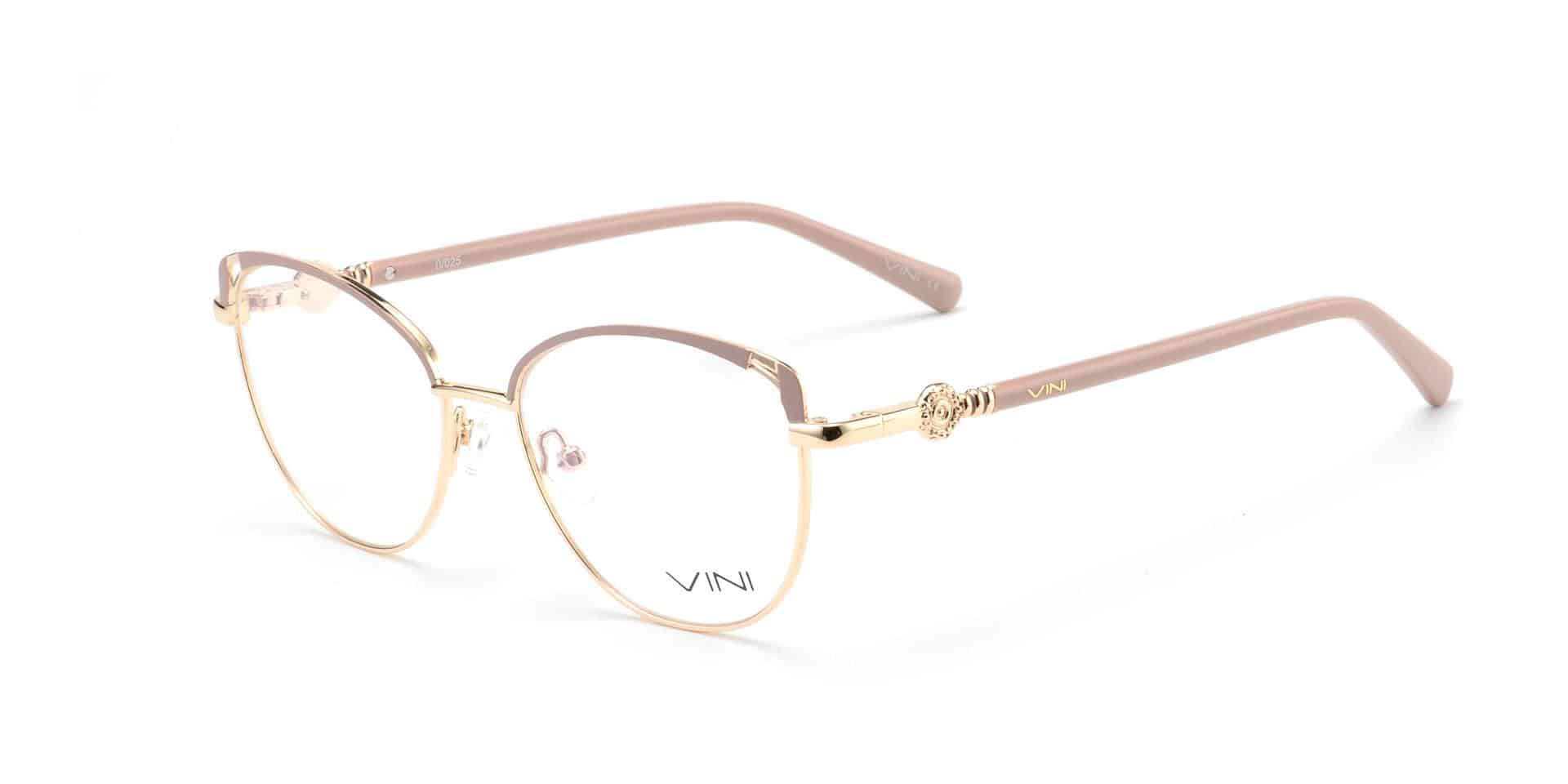 משקפי מתכת עם מסגרת זהב, עדשות עגולות וזרועות חומות בהירות, עם פרטים דקורטיביים ליד הצירים.