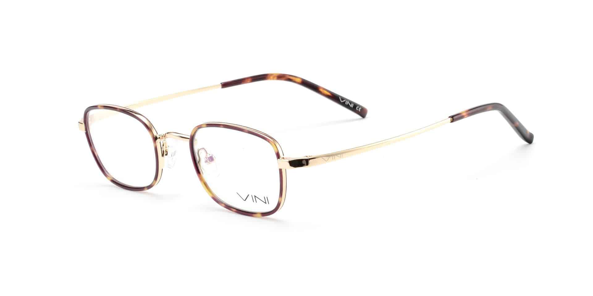 משקפי ראייה מוזהבים עם עדשות שקופות, מוצגים על רקע לבן.