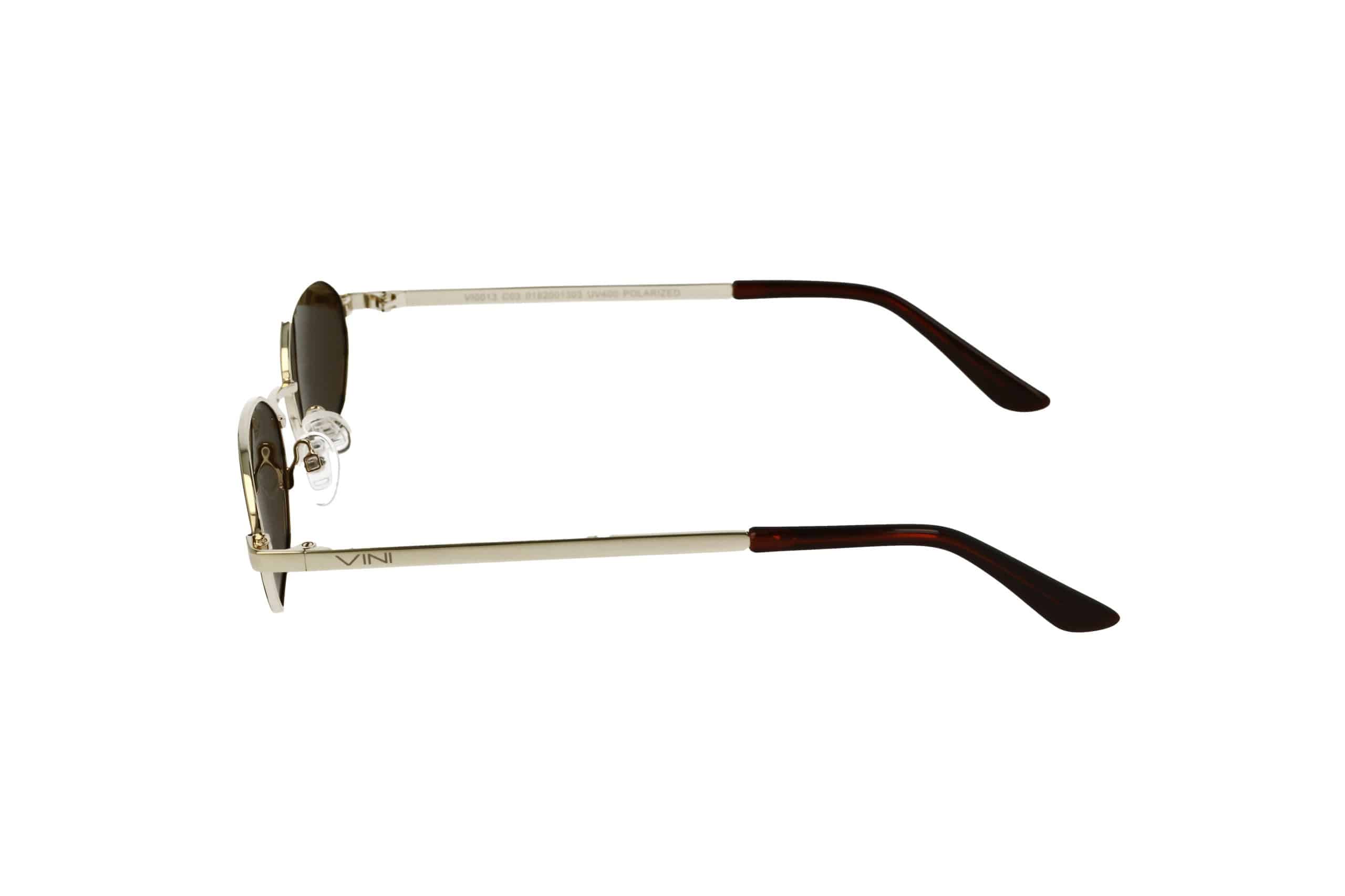 תצוגה צדדית של מתכת עגולים משקפי שמש עם זהב-חום arms ועדשות כהות על רקע לבן.